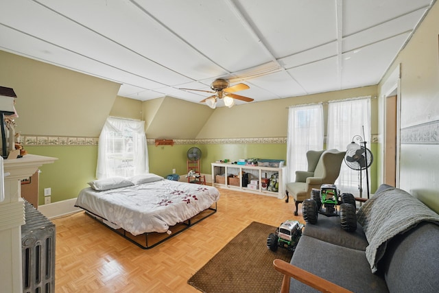 126 Elm St, Newport, ME 04953 - bedroom with baseboards, a ceiling fan, multiple windows, and lofted ceiling