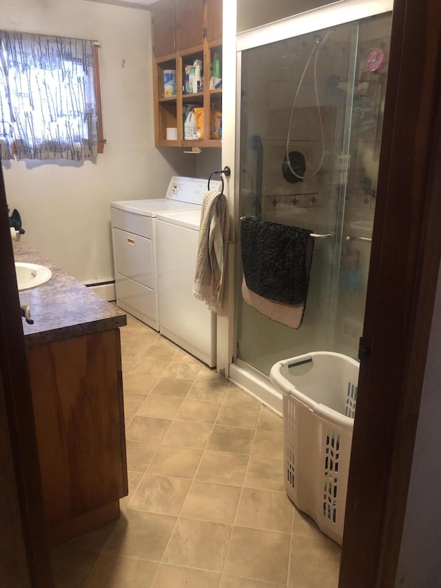 162 Prospect St, Millinocket, ME 04462 - full bathroom with tile patterned floors, washer and dryer, vanity, and a shower stall