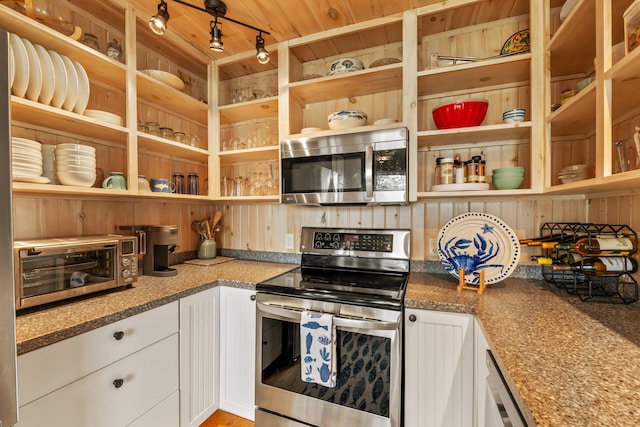 kitchen with a toaster, open shelves, stainless steel appliances, and white cabinetry