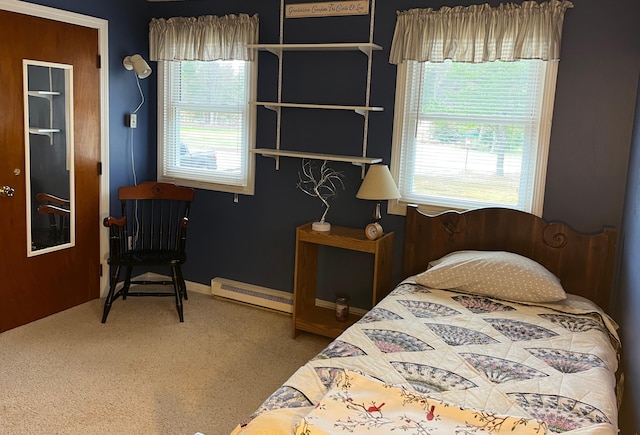 6 Northwood Cir, Hollis, ME 04042 - carpeted bedroom with a baseboard heating unit and baseboards