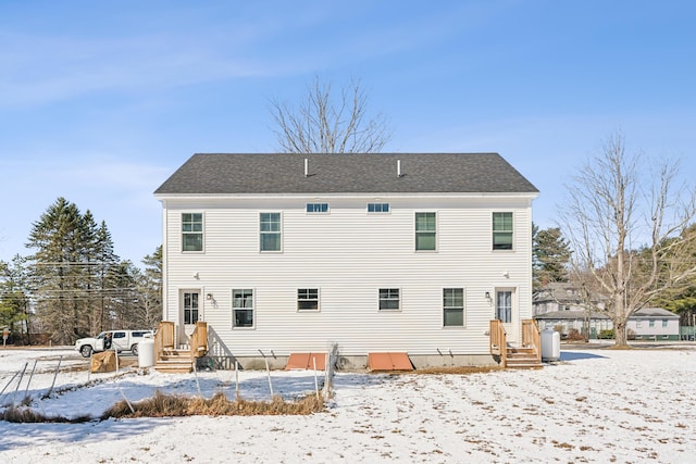 view of snow covered property
