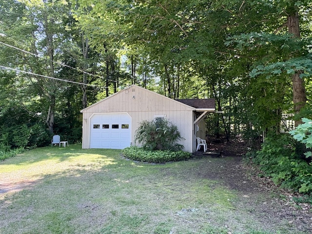25-26 Mass Ave, Raymond, ME 04071 - detached garage featuring driveway