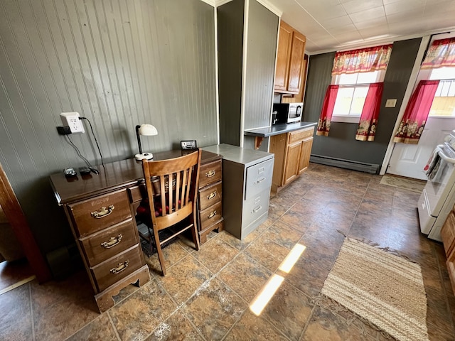 6 Lyons St, Machias, ME 04654 - home office with wood walls, a baseboard radiator, and stone finish flooring
