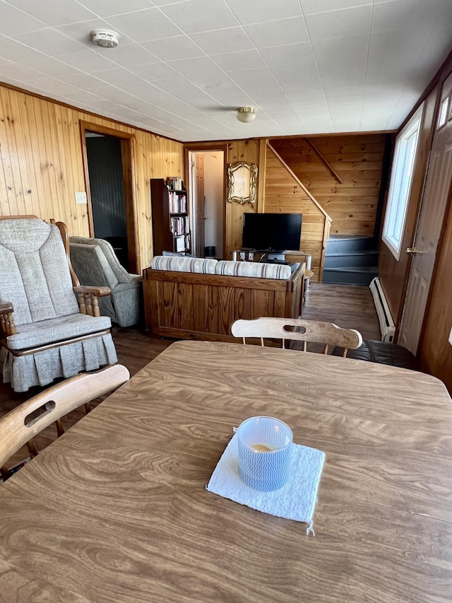 6 Lyons St, Machias, ME 04654 - interior space with wood walls, wood finished floors, and a baseboard radiator