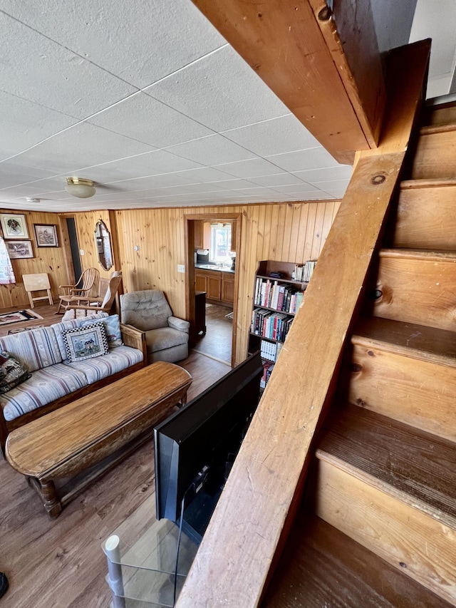 6 Lyons St, Machias, ME 04654 - living room with wood walls and wood finished floors