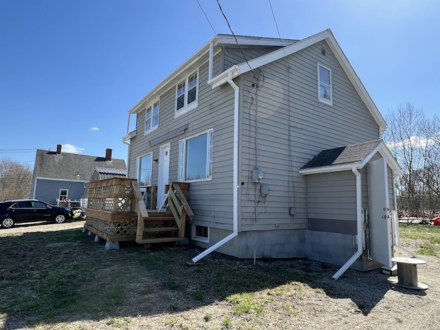 6 Lyons St, Machias, ME 04654 - back of property featuring a deck
