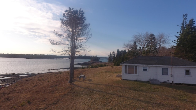 exterior space featuring a water view