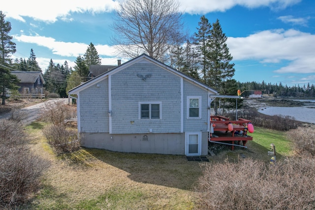 view of home's exterior featuring a lawn