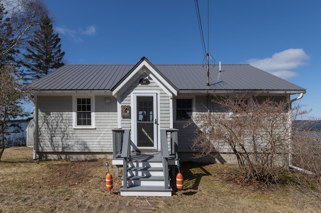 view of front facade with metal roof