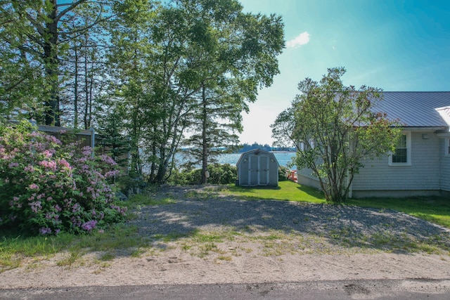 397 Cape Split Rd, Addison, ME 04606 - view of yard with a storage unit