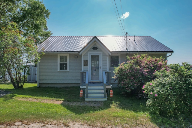 397 Cape Split Rd, Addison, ME 04606 - view of front of home featuring a front lawn and a metal roof