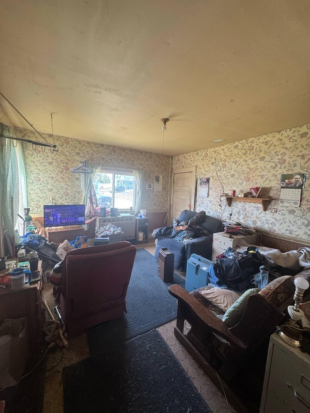 misc room with wallpapered walls and carpet floors