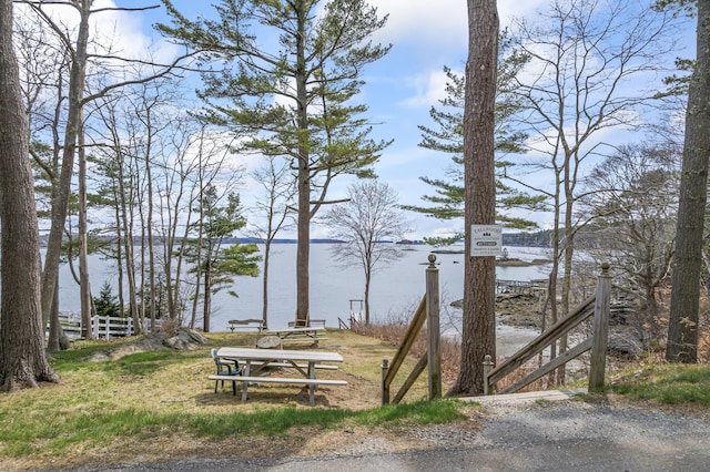 exterior space with a water view