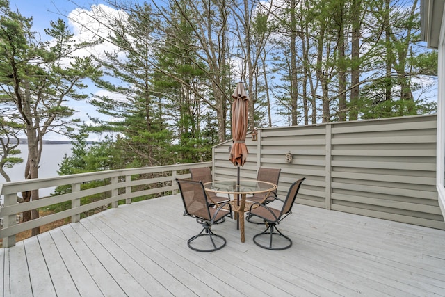 wooden deck with outdoor dining space