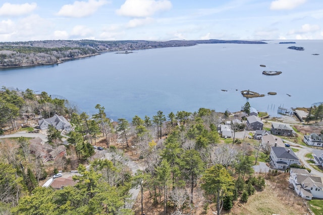 birds eye view of property featuring a residential view and a water view