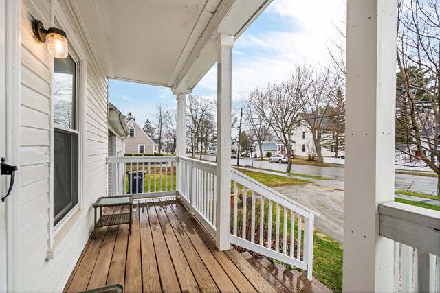 32 Webster Ave, Bangor, ME 04401 - wooden terrace with a residential view and covered porch