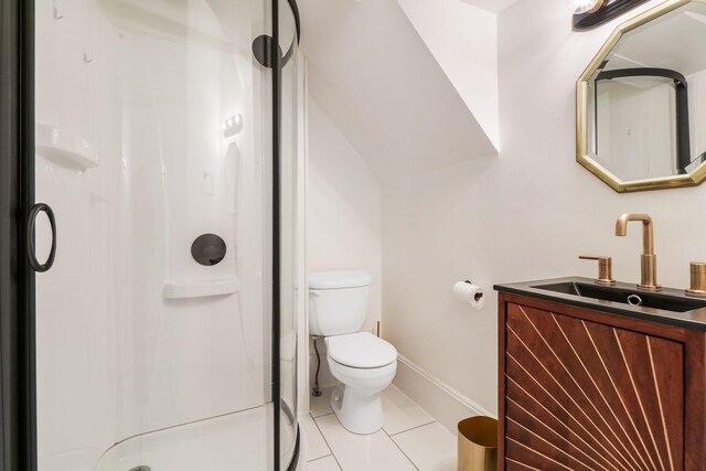 32 Webster Ave, Bangor, ME 04401 - bathroom featuring tile patterned floors, toilet, vanity, baseboards, and a stall shower