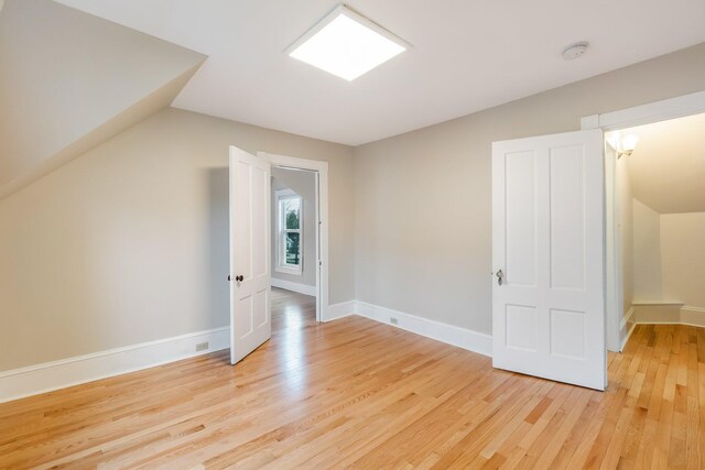 32 Webster Ave, Bangor, ME 04401 - additional living space with baseboards and light wood-style flooring