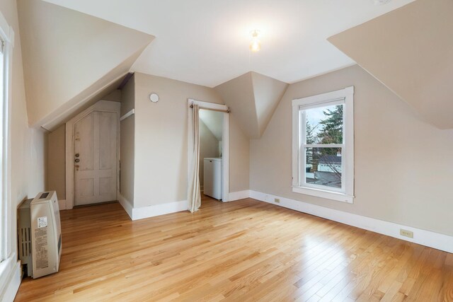32 Webster Ave, Bangor, ME 04401 - bonus room with light wood-style floors, vaulted ceiling, and baseboards