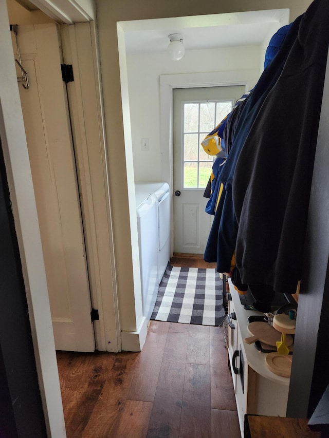 217 Washington Rd, Jefferson, ME 04348 - washroom featuring washing machine and clothes dryer, laundry area, and hardwood / wood-style floors