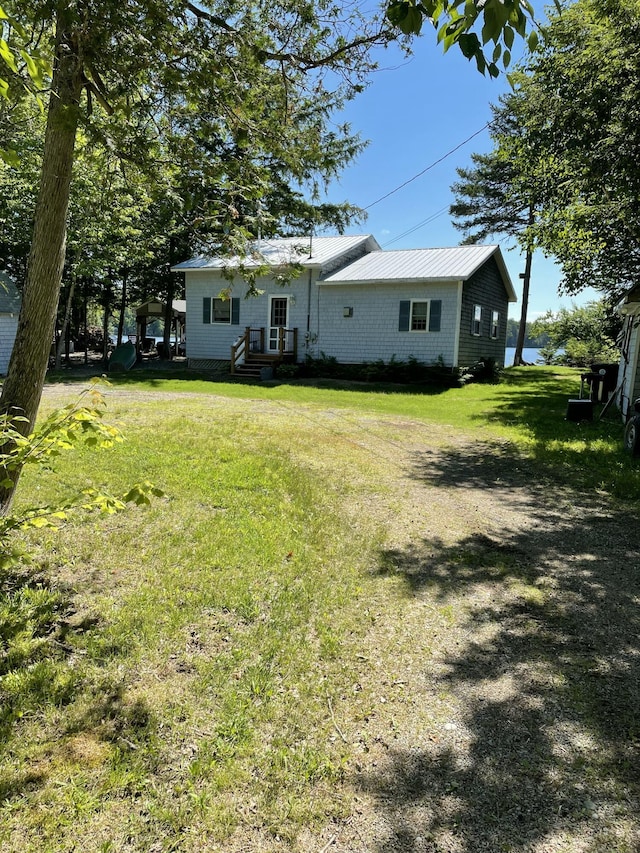 view of yard featuring entry steps