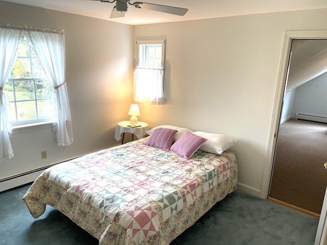 carpeted bedroom featuring baseboards, ceiling fan, and a baseboard heating unit