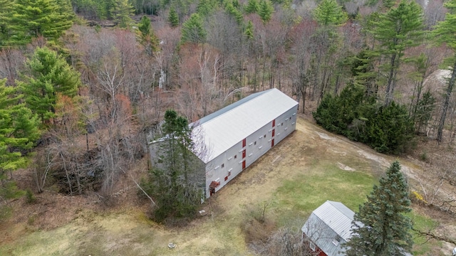 bird's eye view featuring a forest view