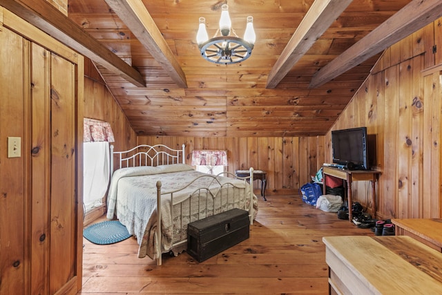 bedroom with wooden ceiling, lofted ceiling with beams, a chandelier, wood walls, and light wood-type flooring