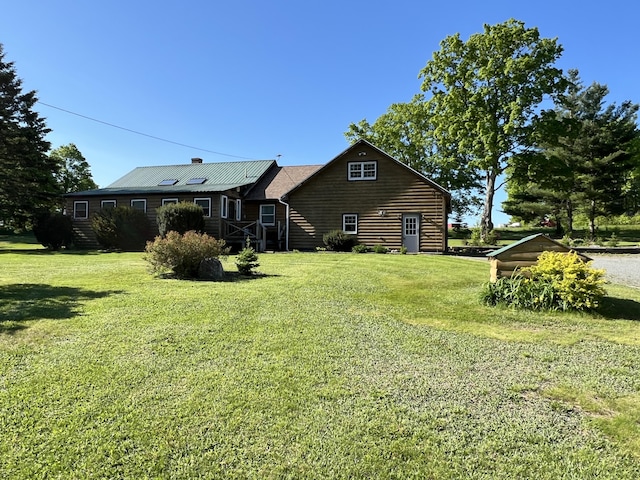 129 Ledge Hill Rd, Corinth, ME 04427 - rear view of property with a yard