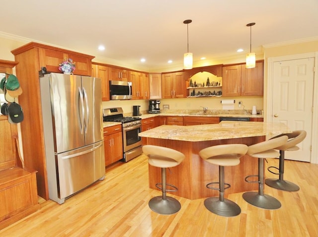 kitchen featuring decorative light fixtures, crown molding, open shelves, a sink, and stainless steel appliances