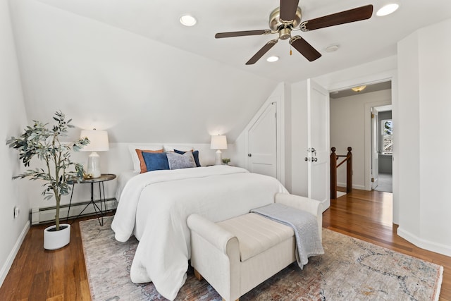 17 US Route 1, Falmouth, ME 04105 - bedroom featuring a baseboard heating unit, baseboards, wood finished floors, recessed lighting, and ceiling fan