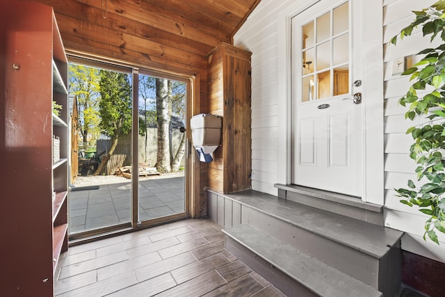 17 US Route 1, Falmouth, ME 04105 - entryway with vaulted ceiling, wood walls, wood finished floors, and wood ceiling