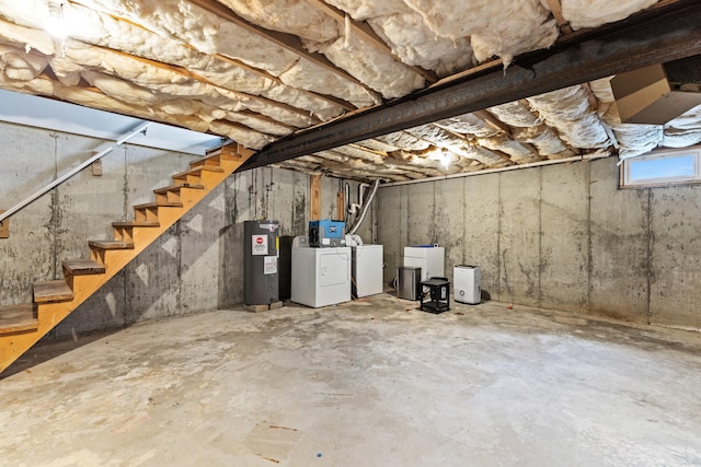 21 Valley St Unit 1, South Portland, ME 04106 - unfinished below grade area with washing machine and clothes dryer, water heater, and stairway