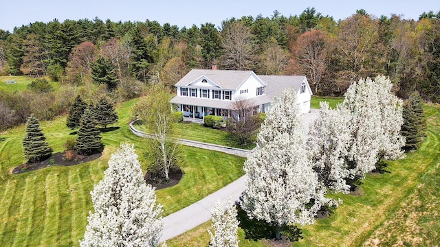 66 Foster Ave, Hampden, ME 04444 - view of subject property with a heavily wooded area