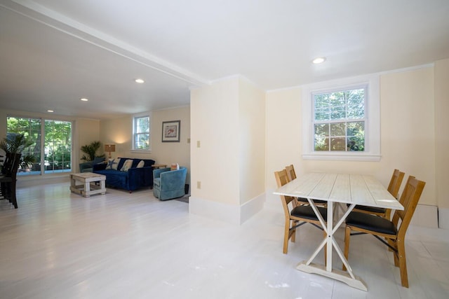 dining area featuring recessed lighting and baseboards