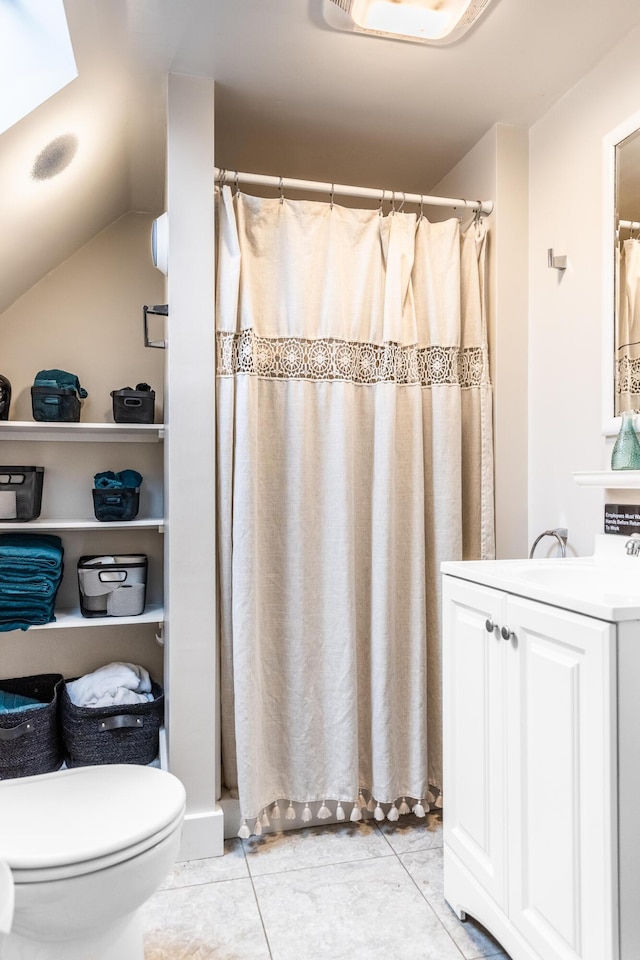full bath featuring a shower with curtain, tile patterned flooring, and toilet