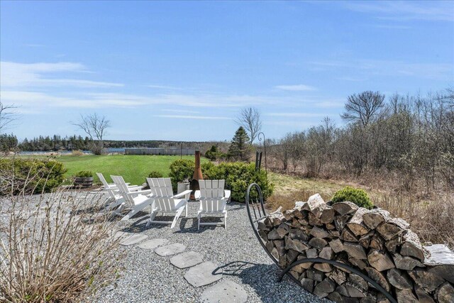 view of patio featuring a fire pit