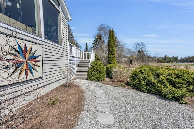 view of yard featuring stairway