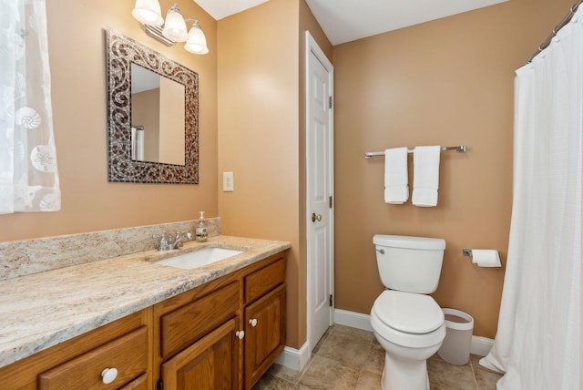 10 Ephraim Tyler Way Unit 10, Kennebunk, ME 04043 - full bath featuring toilet, baseboards, vanity, and tile patterned flooring