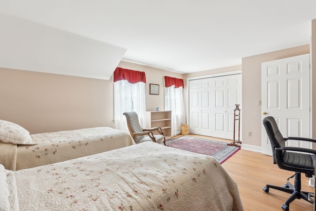 10 Ephraim Tyler Way Unit 10, Kennebunk, ME 04043 - bedroom featuring light wood-style flooring, a closet, and baseboards