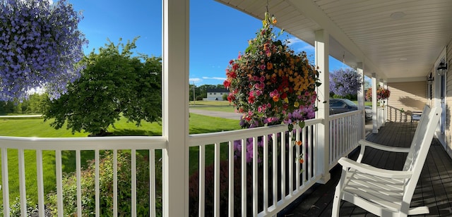 balcony featuring covered porch