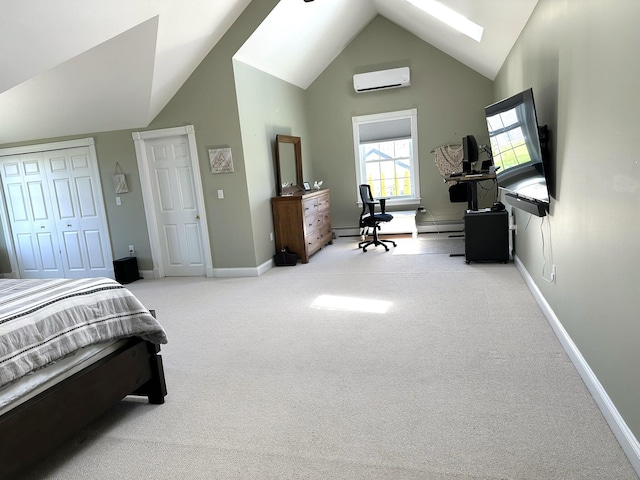bedroom with a skylight, carpet floors, baseboards, and a wall unit AC