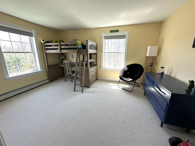 carpeted bedroom with baseboards