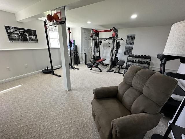 exercise area with baseboards, recessed lighting, and carpet