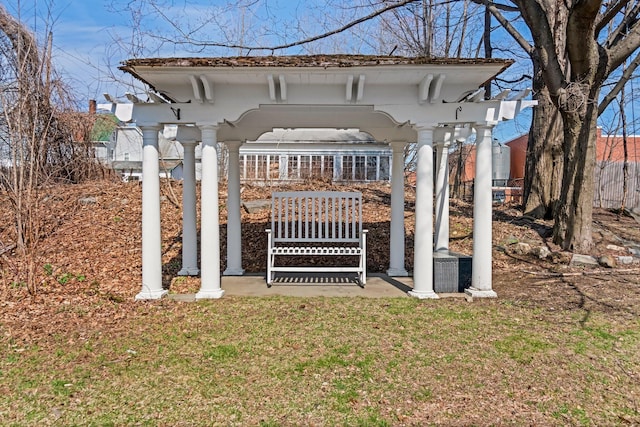 exterior space featuring a yard and fence