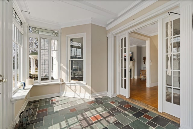 unfurnished sunroom featuring french doors