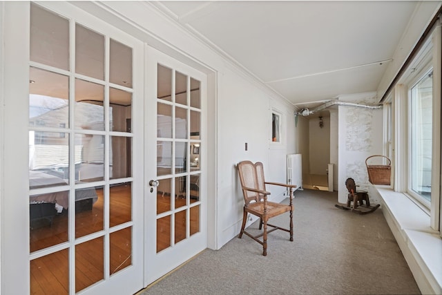 sunroom featuring french doors