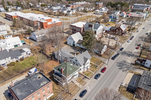 birds eye view of property with a residential view