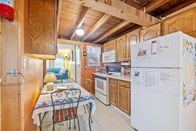 kitchen featuring white appliances, wooden ceiling, beam ceiling, light countertops, and light floors