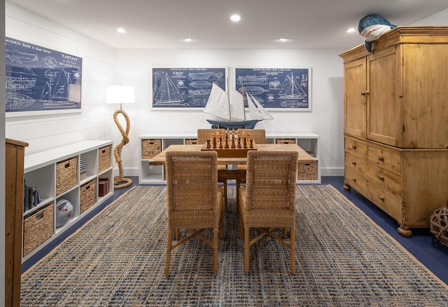 dining room with baseboards and recessed lighting